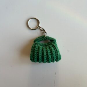Chaveiro bolsinha de croche Encanto